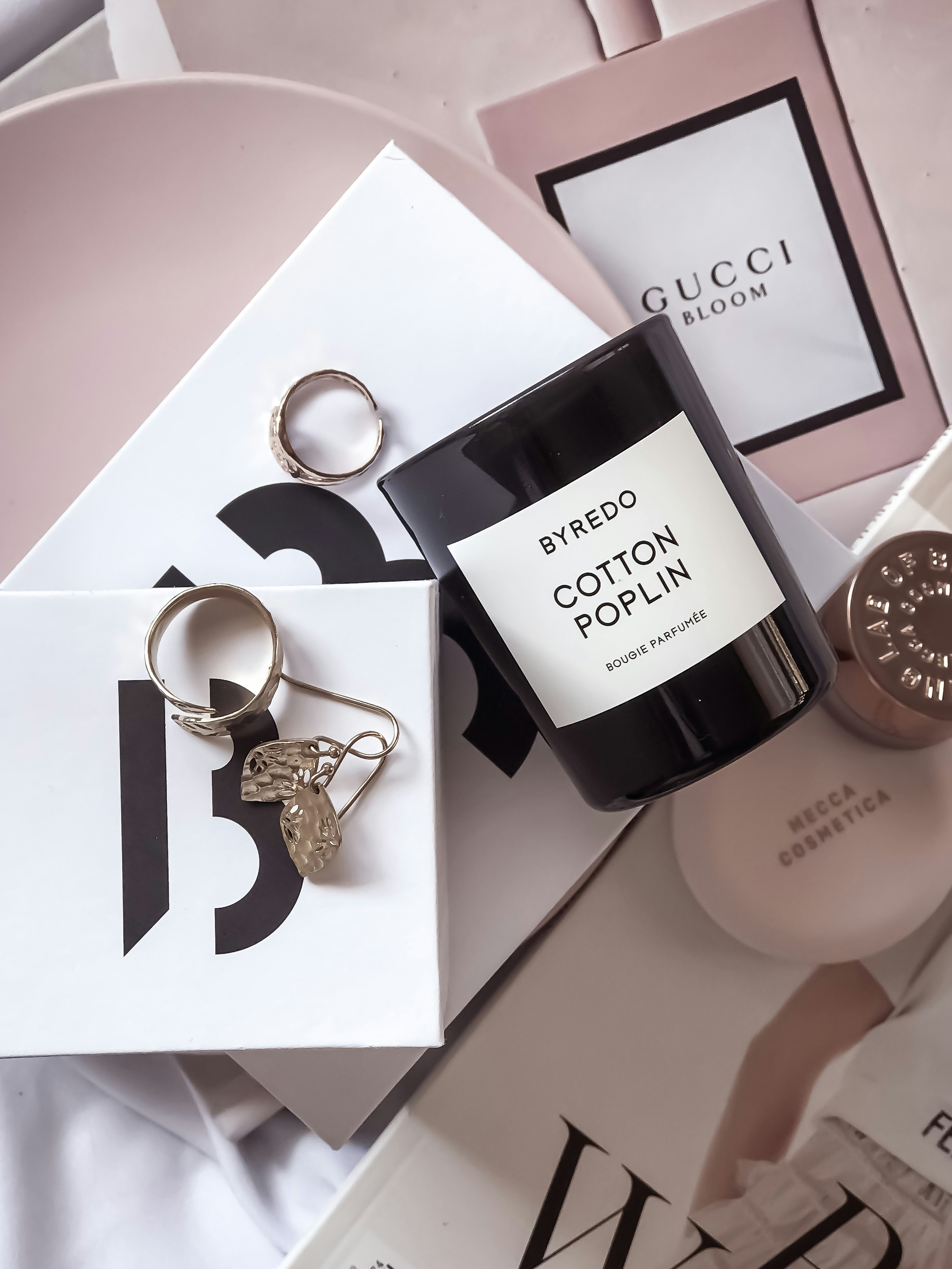 A bottle of perfume sitting on top of a table